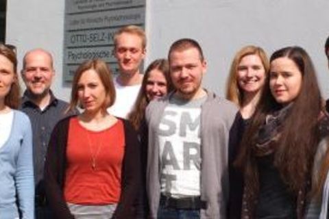 Group picture of the chair in front of university building, FSS 2016